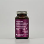 back view of amber glass with organic evening primrose oil capsules on light background 